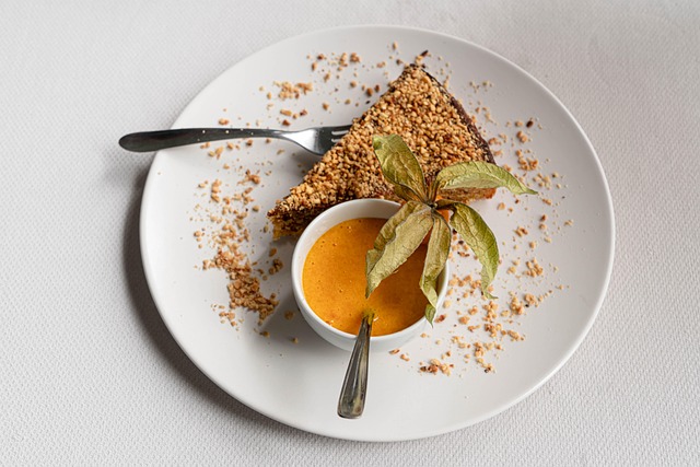 gourmet dish close-up with truffle shavings and gold plated cutlery in dark fine dining scene